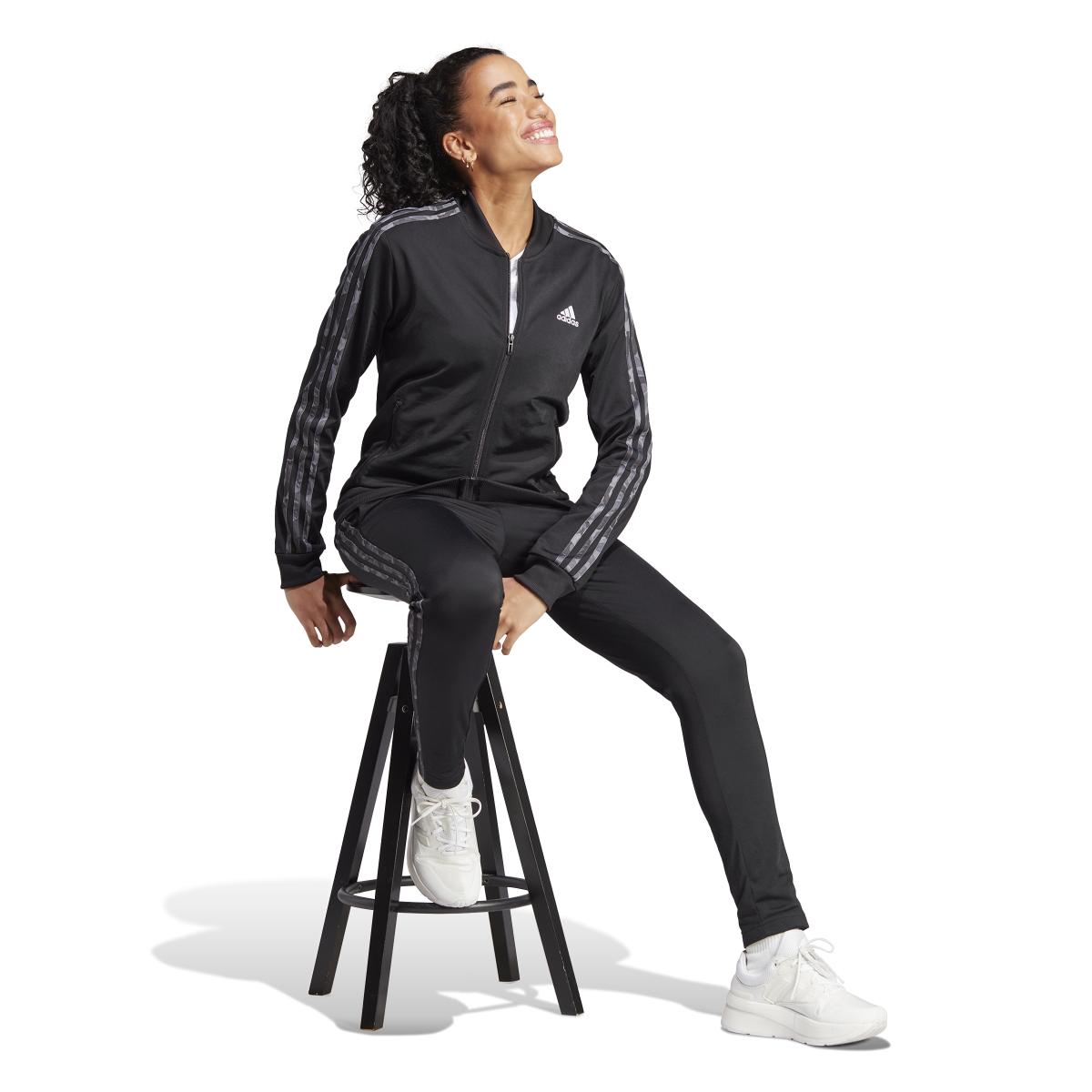 product/a/d/adidas_ij8789_7_apparel_on_model_walking_view_white_bv.jpg