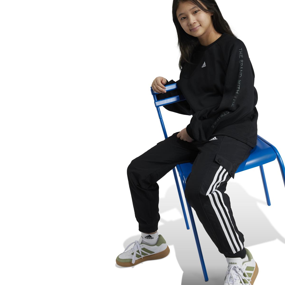product/a/d/adidas_iv7045_6_apparel_on_model_walking_view_white.jpg
