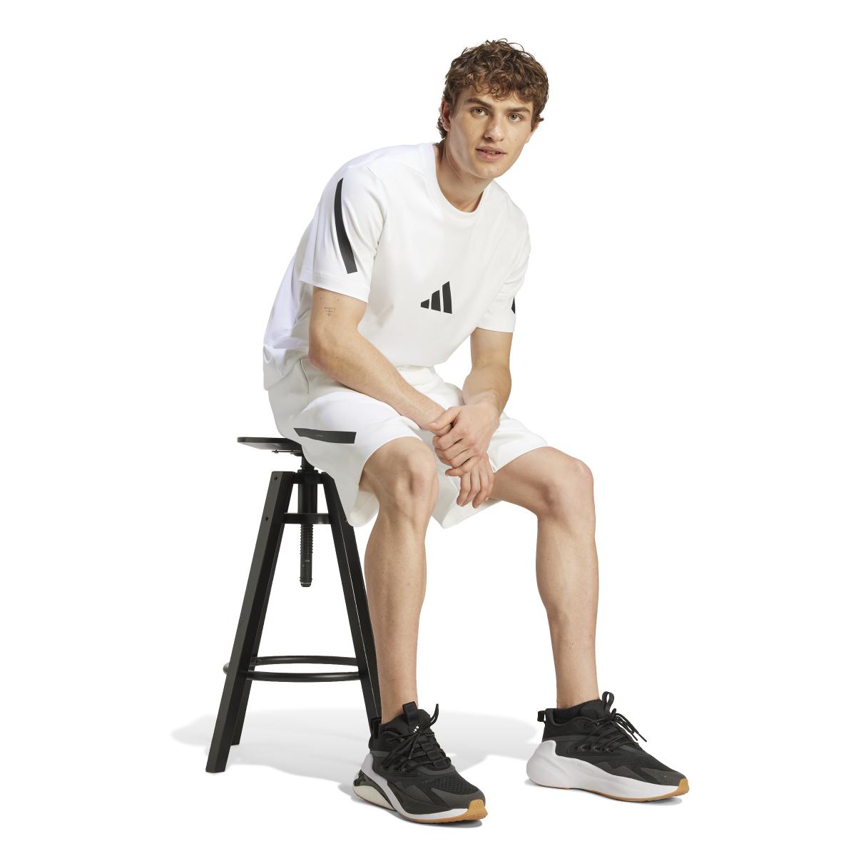 product/a/d/adidas_jj4893_5_apparel_on_model_walking_view_white.jpg