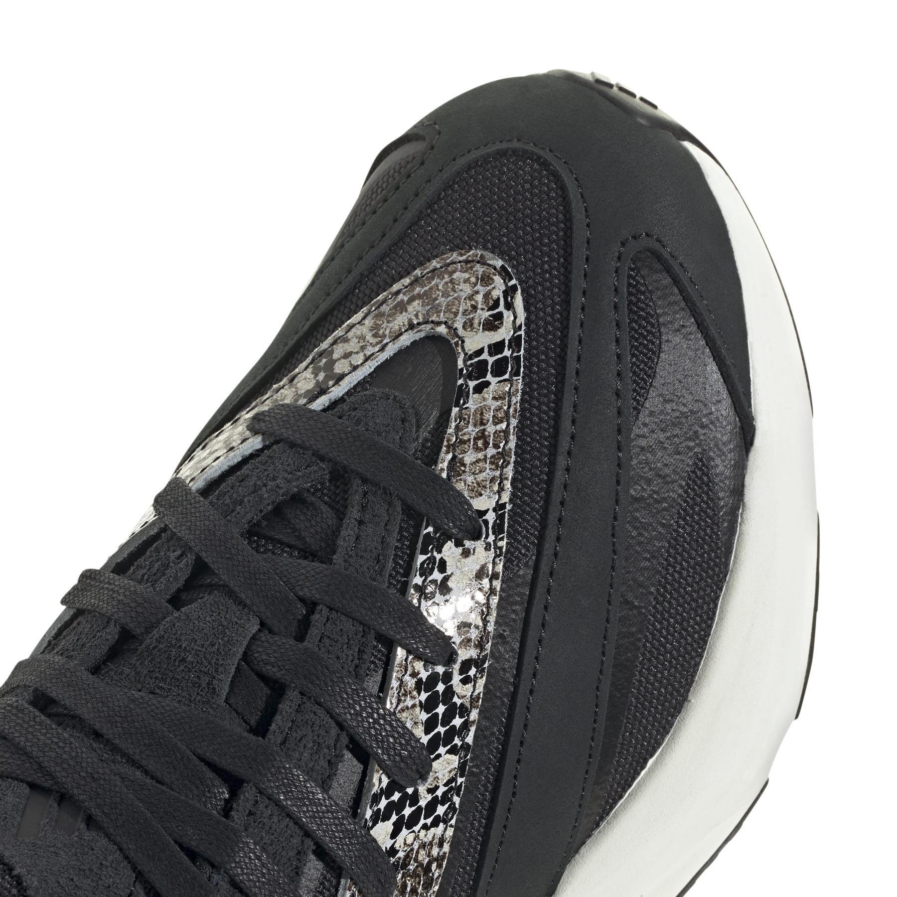 product/2/0/2025_adidas_js2040_9_footwear_photography_detail_view_2_white.jpg