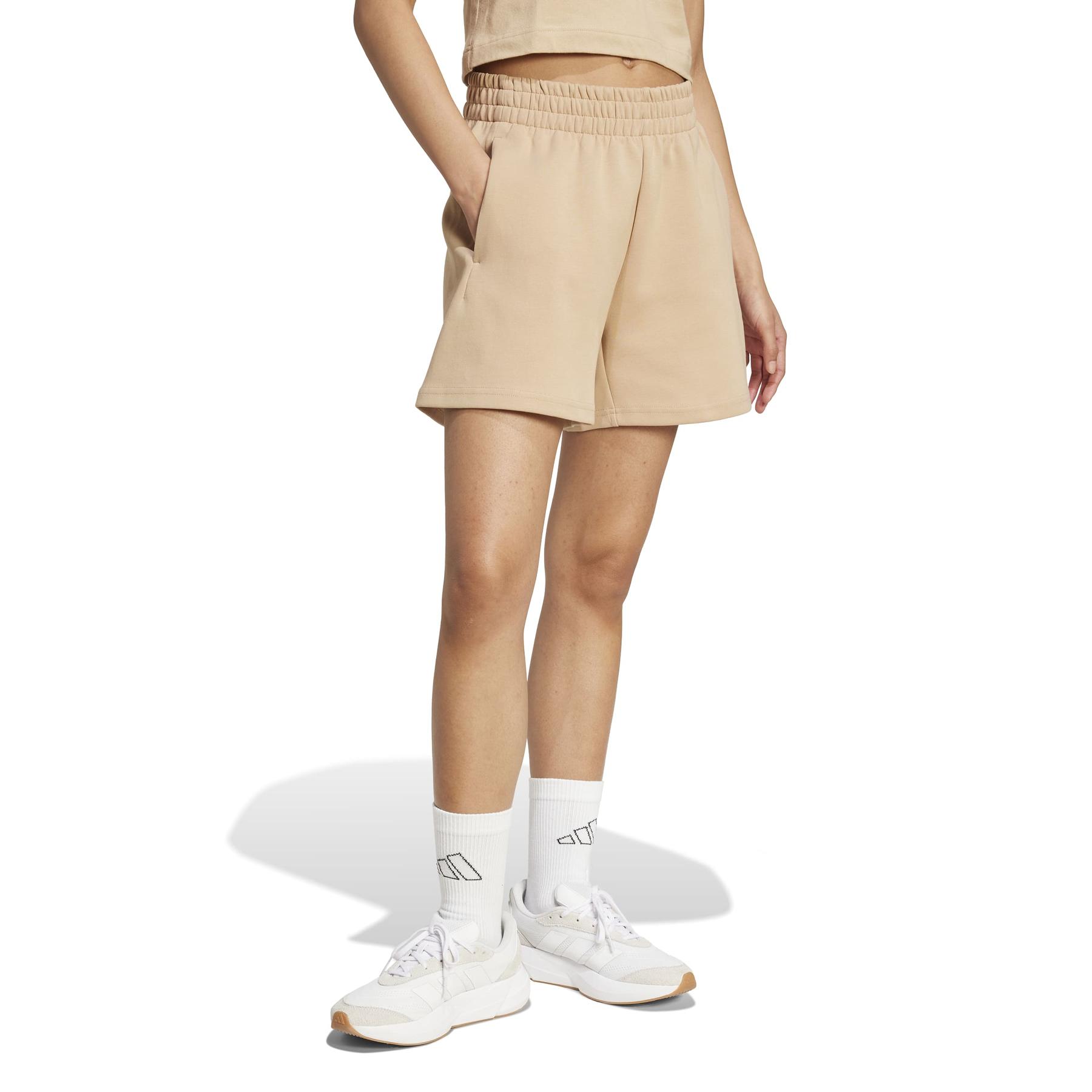product/2/0/2025_adidas_jx0448_4_apparel_on_model_walking_view_white.jpg