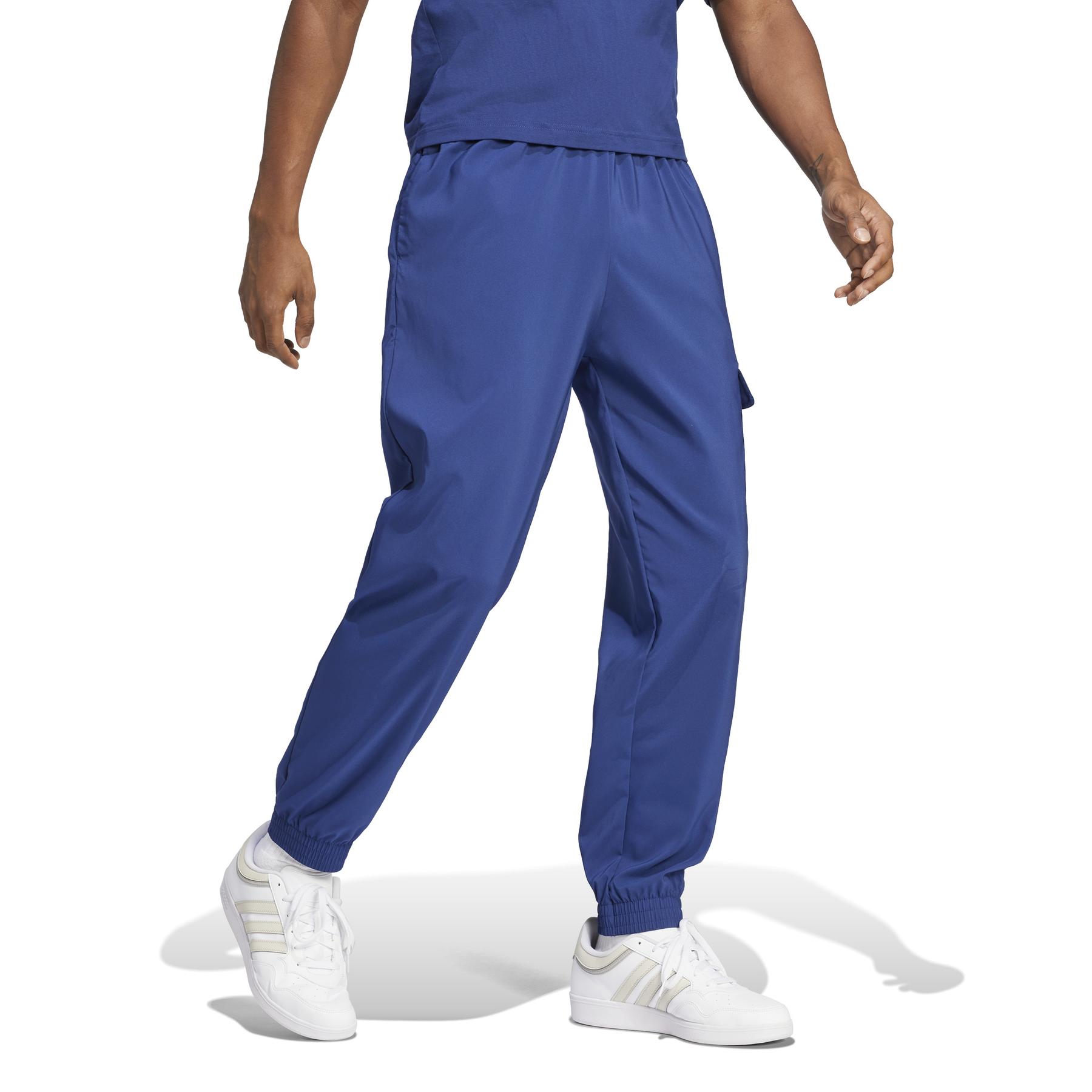 product/a/d/adidas_jd1825_4_apparel_on_model_walking_view_white.jpg