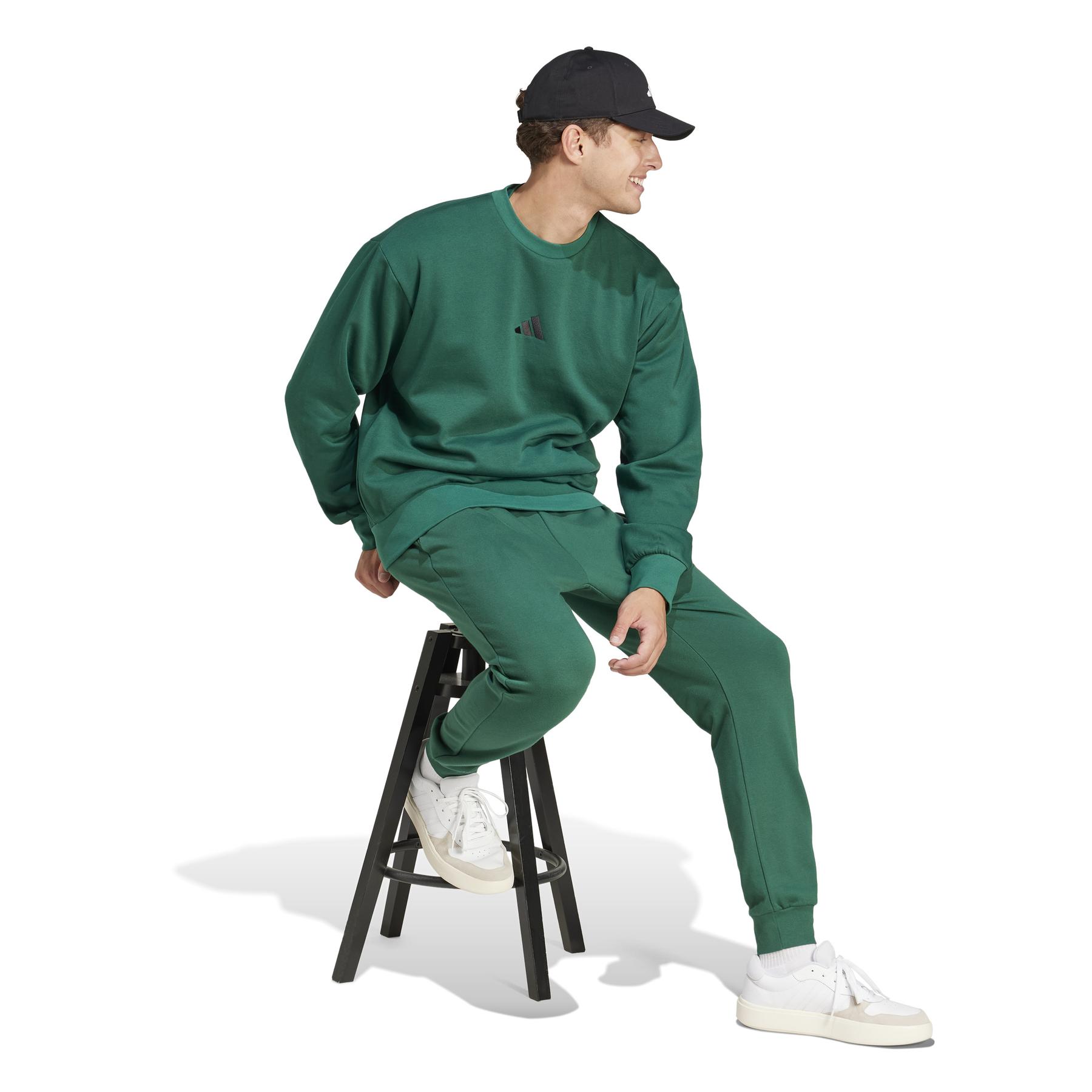 product/a/d/adidas_je3858_4_apparel_on_model_walking_view_white.jpg