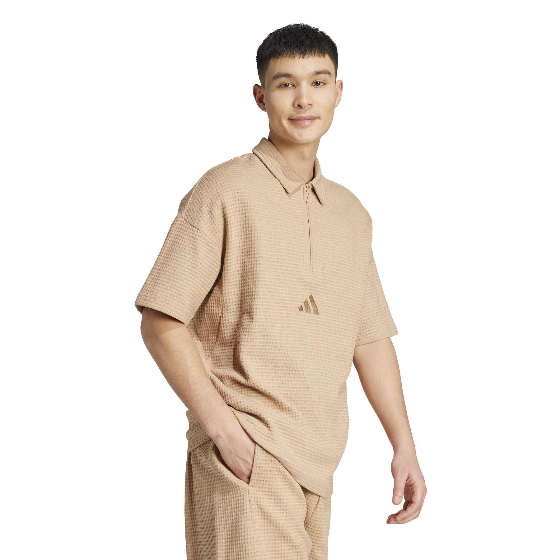 product/a/d/adidas_jl6546_4_apparel_on_model_walking_view_white.jpg