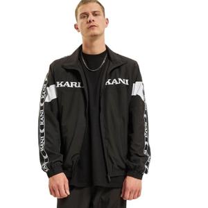 6086924-un-veste-de-survetement-zippee-karl-kani-retro-tape-black